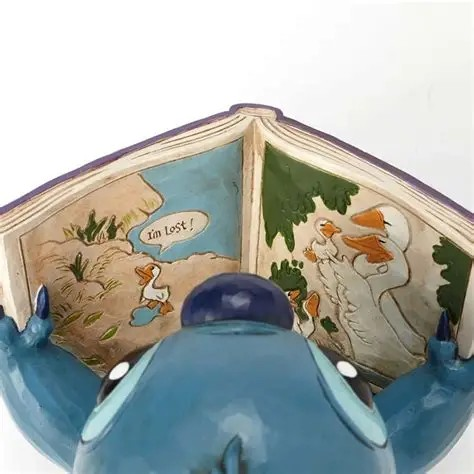 JIM SHORE DISNEY TRADITIONS FINDING A FAMILY STITCH FIGURE