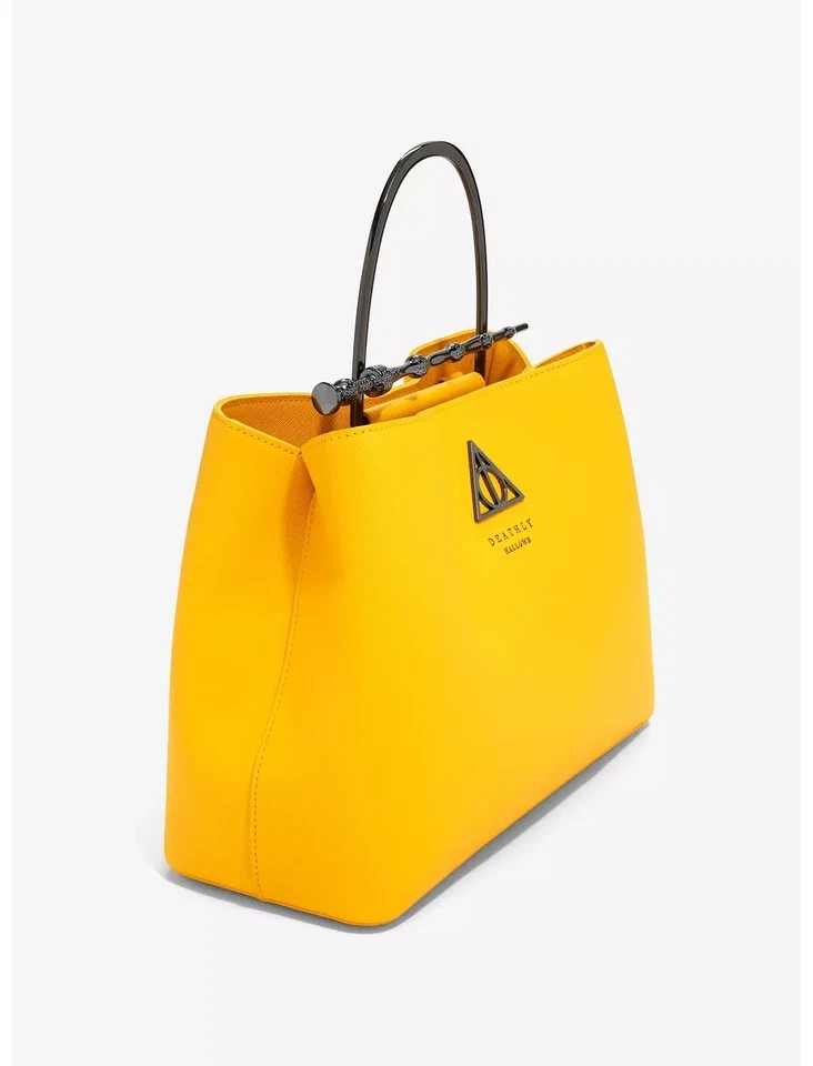 LOUNGEFLY HARRY POTTER AND THE DEATHLY HALLOWS YELLOW HAND BAG