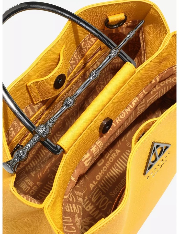 LOUNGEFLY HARRY POTTER AND THE DEATHLY HALLOWS YELLOW HAND BAG