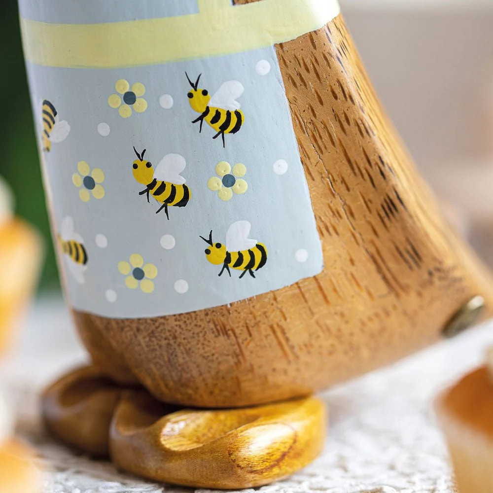 DCUK BEE APRON FRONT FACING FIGURE