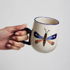 JONES AND CO MOTH PARTY BLUE MUG