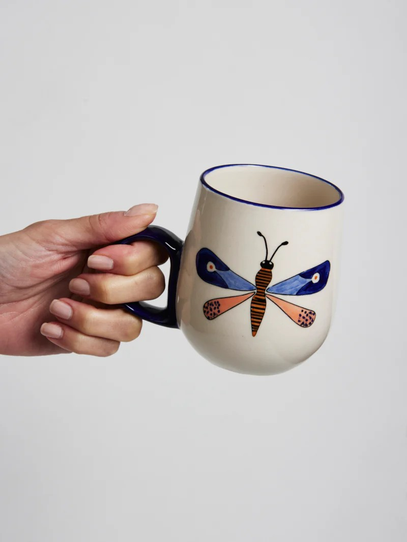 JONES AND CO MOTH PARTY BLUE MUG